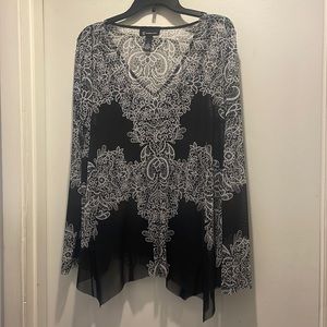 Like new! Sheer long sleeved shirt with build in cami